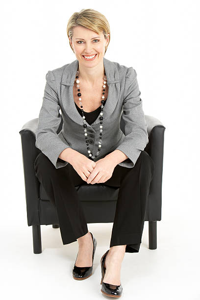 Business woman Sitting In Chair stock photo