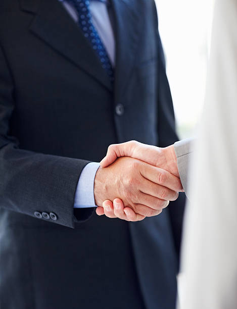 istock Business colleagues shaking hands 157485292