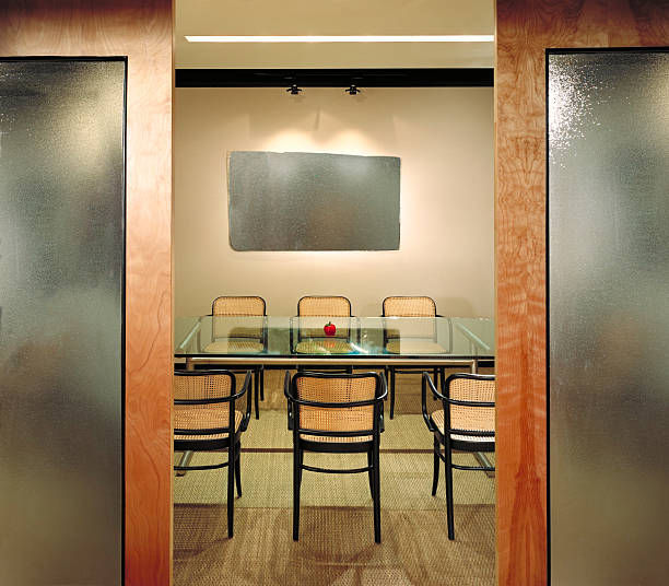 Modern Place of Work Interior of modern corporate environment: contemporary office design. frosted glass door office stock pictures, royalty-free photos & images