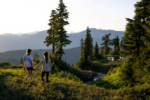 istock Mother and daughter bonding in nature 1574854052