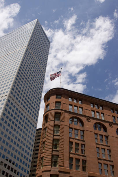 The Brown Palace Hotel stands next to modern skyscraper and is the second oldest hotel in downtown built in 1892 and located in Denver, Colorado.