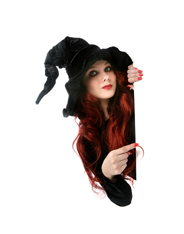 silhouette of a girl in a witch hat holding a decorative bat for halloween 3d-rendering.