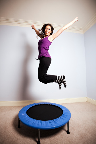 A young gymnast trains on a trampoline. Posing. Lickmy-Lypse '09