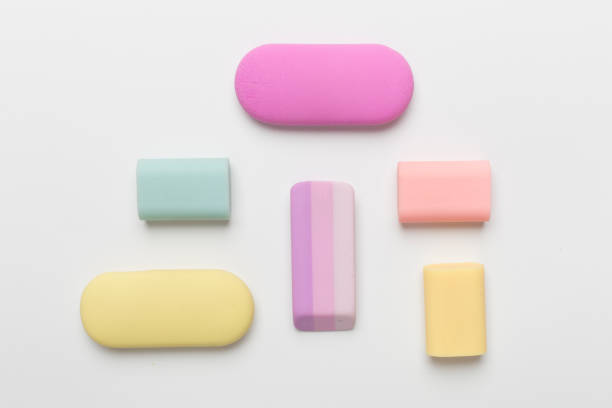 istock Colorful erasers on color backgroung, top view 1574929269