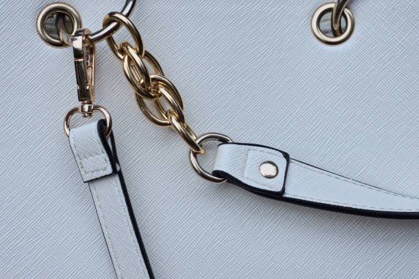 istock one yellow metal latch with a ring with chain on the strap 1575000482