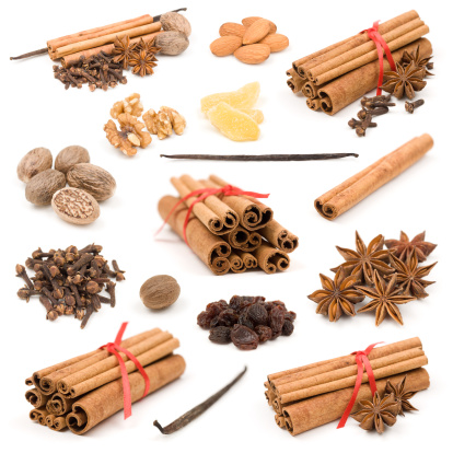 Flat lay cosmetic mockup with brown bottle without label, cinnamon sticks, anise, dried orange slices and coffee on white background. Health herbs, headache relief and reduce stress