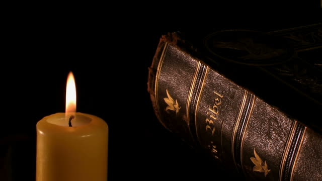 Old bible and candles