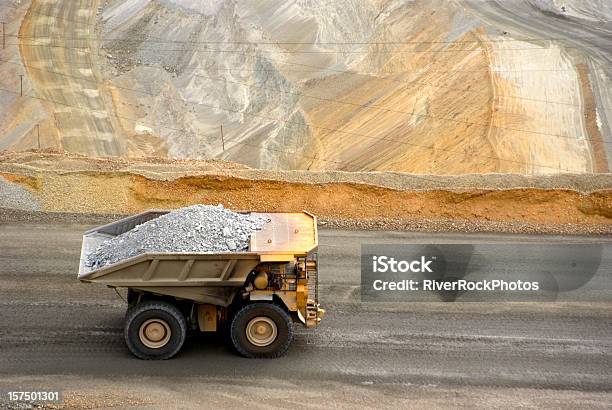 Yellow Large Dump Truck In Utah Copper Mine Seen From Above Stock Photo - Download Image Now