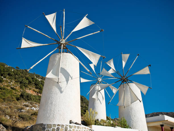 griechisch windmühlen - agios nikolaos stock-fotos und bilder