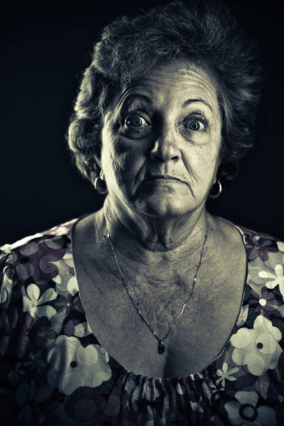 istock terrified senior woman 157501907