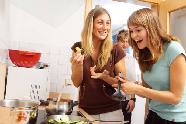 istock friends having a small party at home 157502279