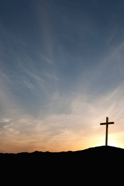 istock Solitary Cross at Sunset 157502334