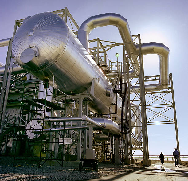 Gas Plant with 2 Figures stock photo
