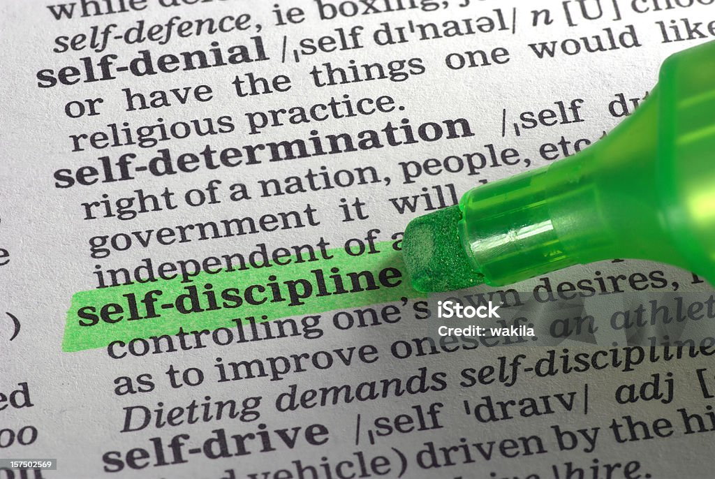 discipline définition de Dictionnaire highligted - Photo de Auto-discipline libre de droits