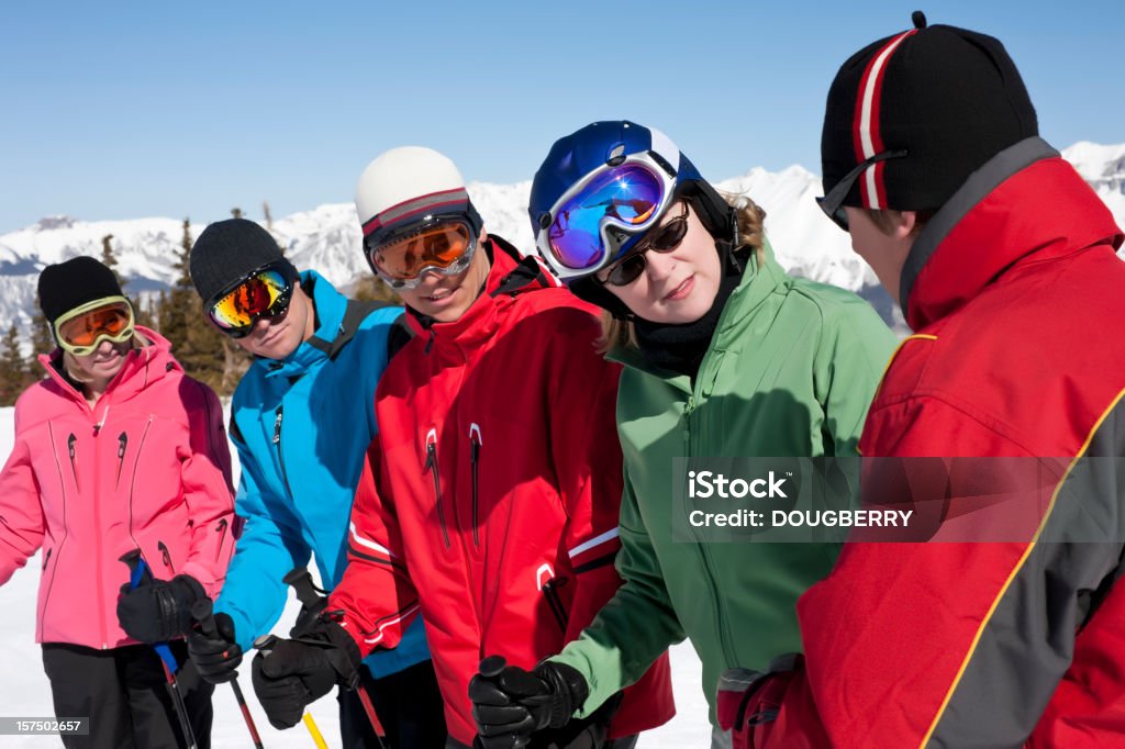 Ski lessons Instructor speaking to his students Adult Stock Photo