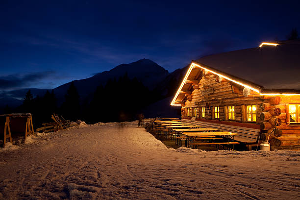 tyrolean winter hut stock photo