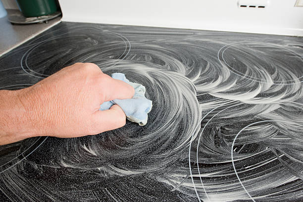 istock Cleaning a Ceramic Stovetop. 157503089