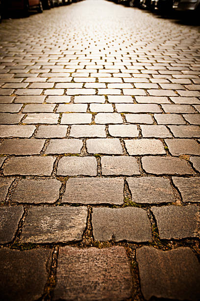 istock Street paved with granite setts 157503169