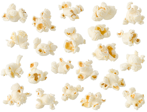 Arrangement of popcorn kernels isolated on white background