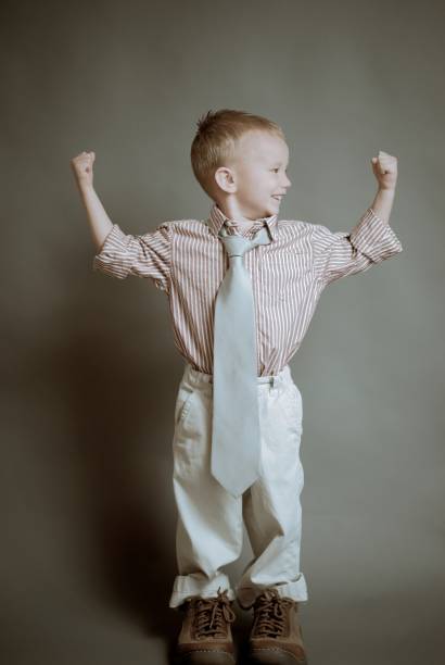istock Child flexing muscle 157503808