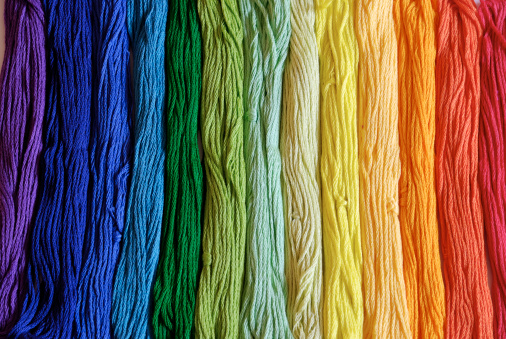 Crochet Club. Elderly women friends knitting together with colored wool.