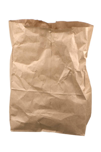 A wide shot with plenty of copy space of a tanned ethnic man with a brown paper bag on his head. The eyes have it! Unsharpened or tweaked. EOS 5D. See alternatives below or in MY PORTFOLIO