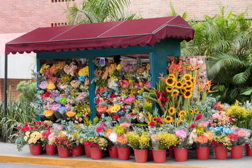 Flower shop on the street, a lot of colorful flowers.