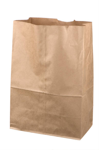 istock Isolated empty brown grocery bag on white background 157504466