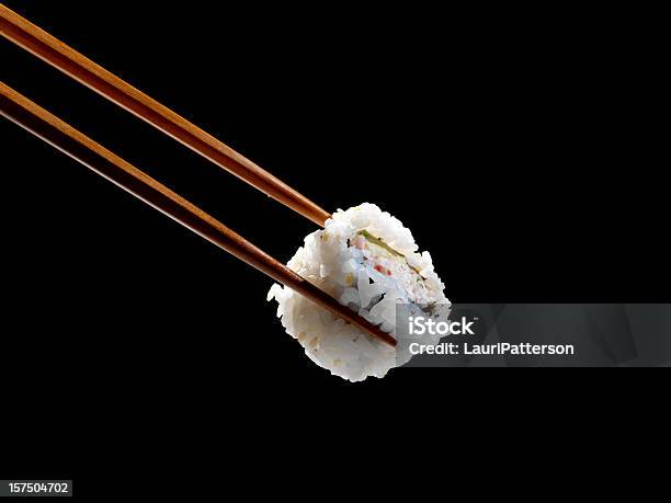 Sushi Em Pauzinhos - Fotografias de stock e mais imagens de Sushi - Sushi, Pauzinhos, Cor preta