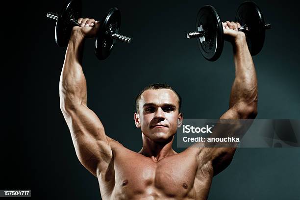 Body Builder Exercising Stock Photo - Download Image Now - 20-24 Years, 20-29 Years, Abdominal Muscle