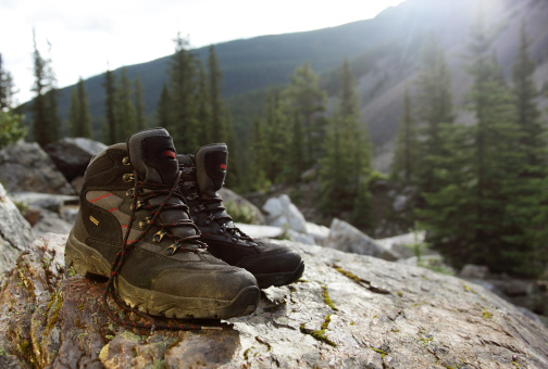 Pair of hiking boots in a lovely scenery in Canada: Moraine lake, Alberta, without the lake :-)