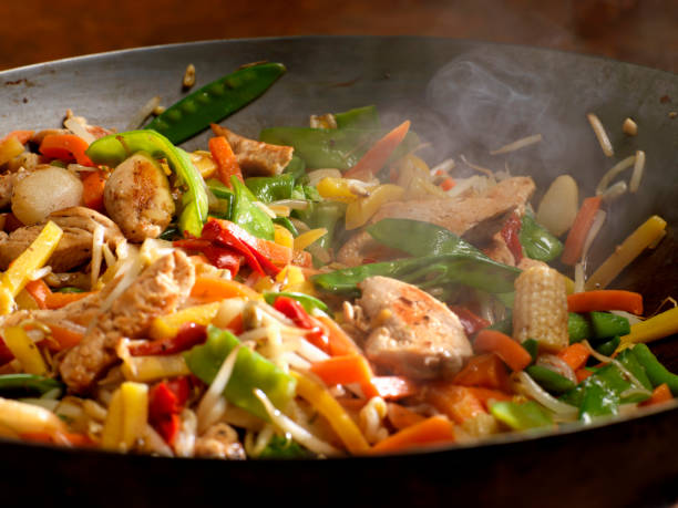 Chicken and Vegetable Stir Fry  stir fried stock pictures, royalty-free photos & images