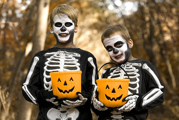 istock Trick or Treating Skeletons 157505161