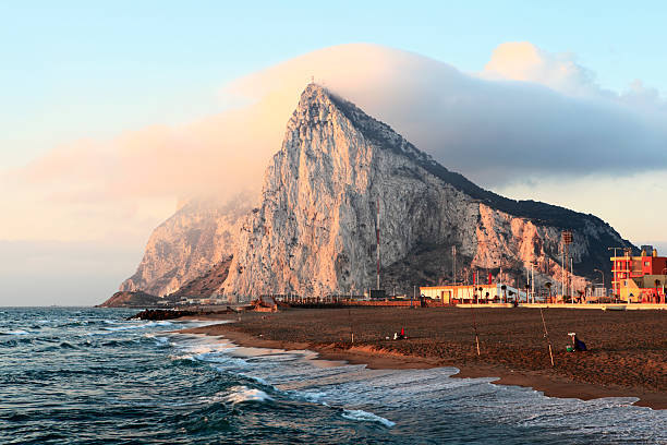 istock Gibraltar at sunrise with clouds on top 157505277