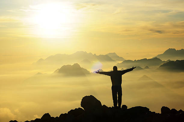istock Man on top of the mountain 157505388