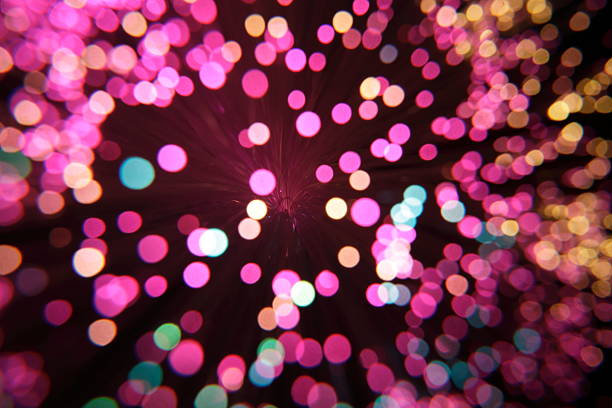 Out of focus purple light dots stock photo