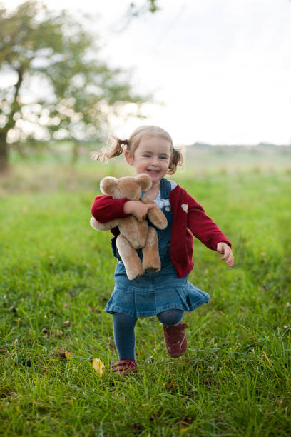 istock Little girl running 157505669