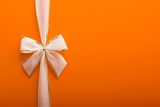 Orange cadeau avec un arc - Photo