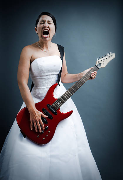 a bride playing out loud a rock song