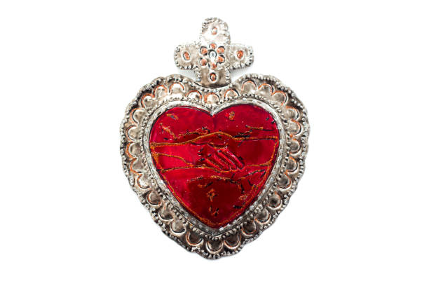 istock Red Tin Milagros Heart on White Background 1575064943
