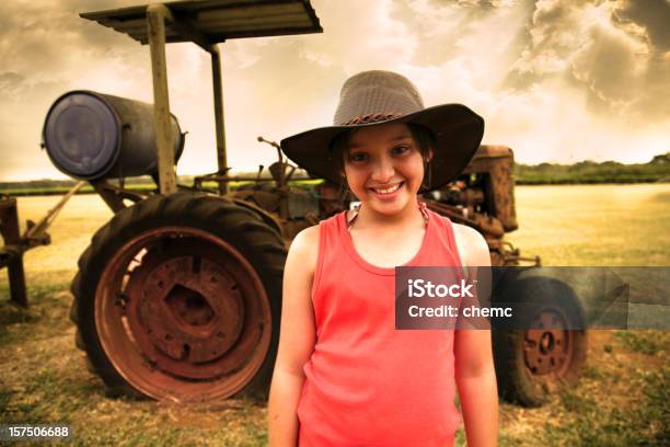 Young Farmer Girl And Tractor Stock Photo - Download Image Now - Australia, Child, Farm