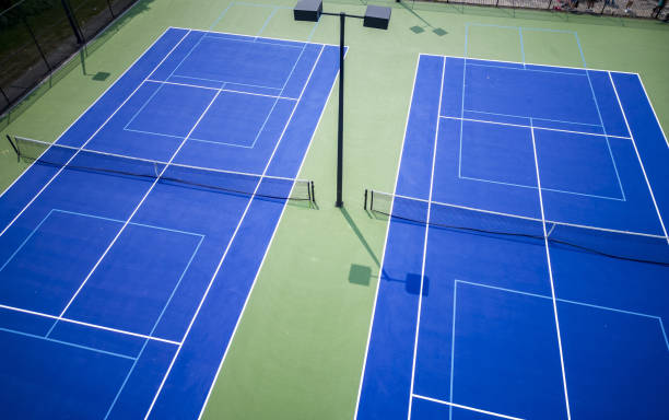 istock Two tennis courts that also have pickleball lines 1575068042