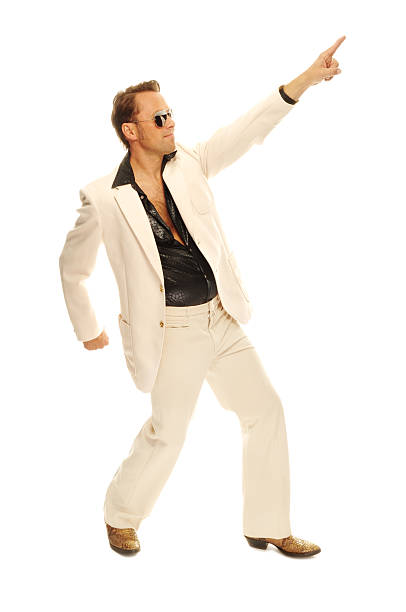 Cтоковое фото МНД Танцор диско в белом костюме и сапоги из кожи змеи