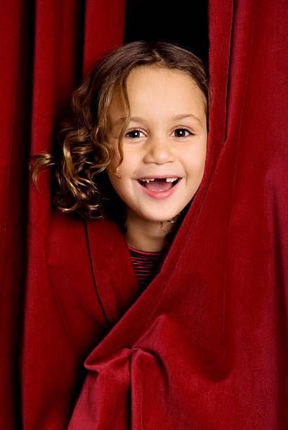 Little laughing performer  color image performing arts event performer stage theater stock pictures, royalty-free photos & images