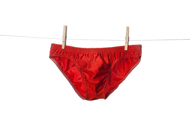 rosso slip - swimming trunks bikini swimwear red foto e immagini stock