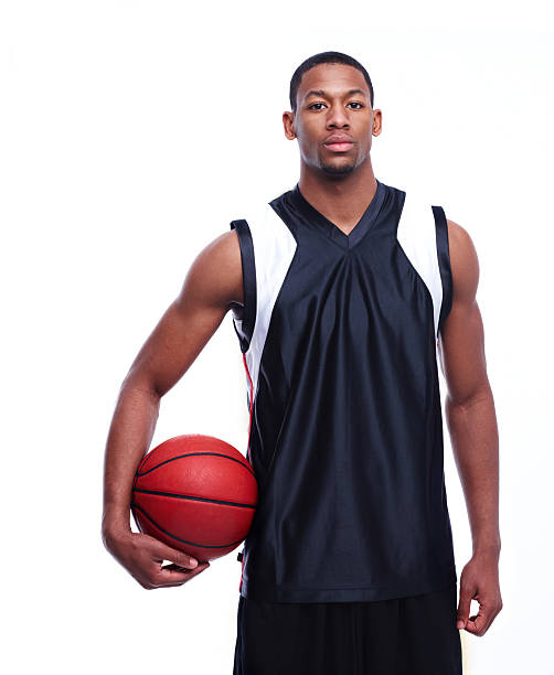 Portrait of an African American basketball player  basketball uniform stock pictures, royalty-free photos & images