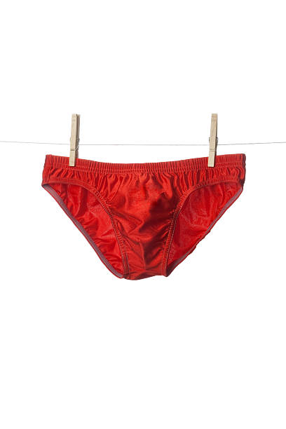 rosso slip - swimming trunks bikini swimwear red foto e immagini stock