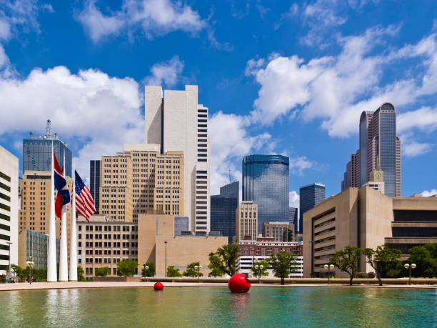 Dallas city skyline from the 180-foot diameter reflecting pool in the Park Plaza at the Dallas City Hall