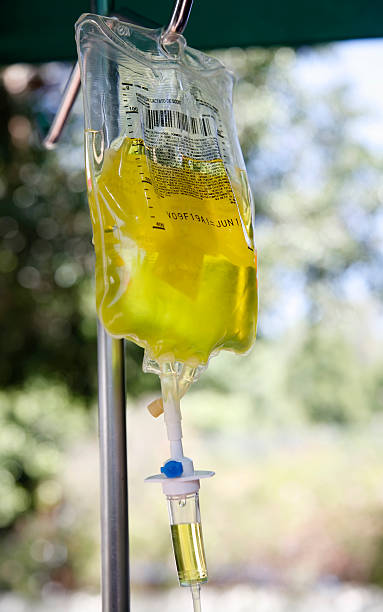 Vitamin C Intravenous Drip  saline drip stock pictures, royalty-free photos & images