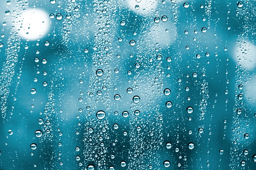 Glass Symphony: Raindrops Play a Melodic Tune